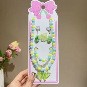 Kids beaded jewelry set featuring a cute butterfly pendant, necklace, bracelet, earrings.