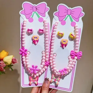 Children pink pearl necklace earrings ring set cute butterfly bow jewelry accessory detail view