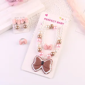 Kids pearl necklace bracelet clip-on earrings ring set with cute bow design for girls gift.