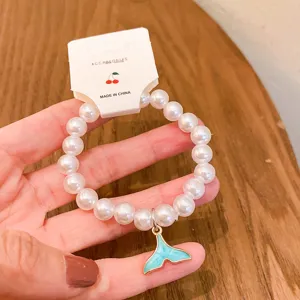 Korean style fashion white faux pearl bracelet with cute blue whale tail pendant jewelry.