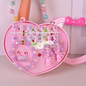 Kids pink heart storage box with press-on nails, bracelet, ring and mermaid hair clips set