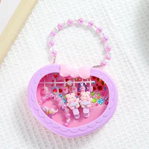 Cute children hair clip set with heart shaped handbag and bracelet, perfect gift for little girls.