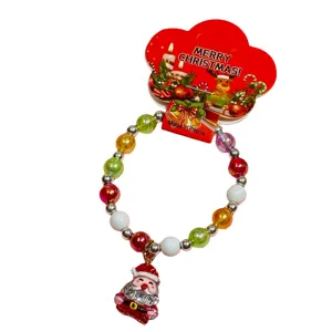 Cute children Christmas beaded bracelet with Santa Claus pendant, beautiful festive gift.