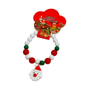 Christmas children beaded bracelet with cute Santa Claus pendant and festive packaging.