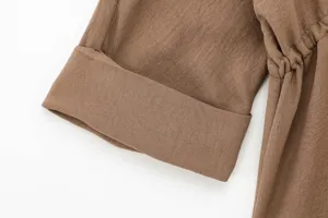 Women casual fashion long sleeve shirt trousers set detail brown cuff close up view