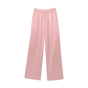 Pantalón ancho rosa para mujer con cintura elástica de cordón y suave tejido texturizado.