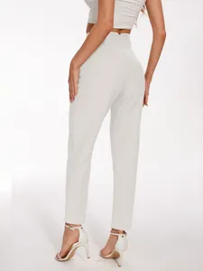 Back detail view of women's high-waisted casual suit trousers in off-white, elegant slim fit.