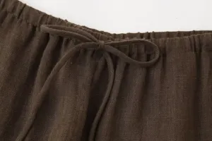 Detailed view of dark brown linen drawstring waistband for women's casual pants and top sets.