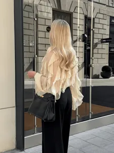 Chic women's long sleeve ruffled blouse in elegant beige, perfect for spring and casual wear.