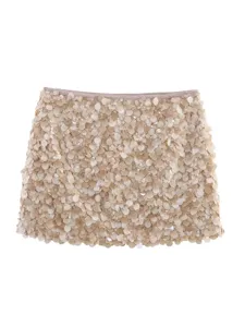 Stunning champagne sequin mini skirt for women, perfect for summer parties and stylish nightlife.