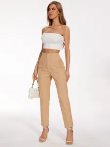 Women high-waisted casual suit trousers paired with a white crop top for stylish daily wear.