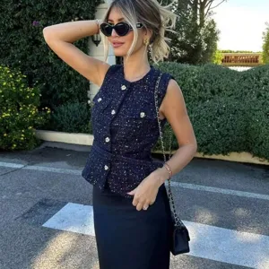 Women tweed textured sleeveless vest with metallic buttons and belt for stylish spring casual look.