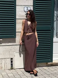 Detailed view of women summer textured vest top and long skirt set in elegant style.