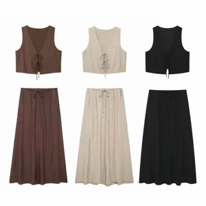 Women summer two piece set v-neck tie-up crop vest and matching long skirt outfits.