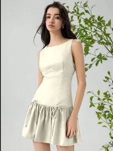 Sleeveless mini dress with bow ties, chic resort style cream dress for women spring fashion