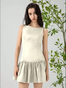 Sleeveless short dress featuring cute bow ties and a stylish drop-waist ruffled hem for women.