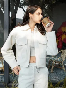 Women's short jacket detail, casual white outerwear, versatile autumn fashion clothing product.