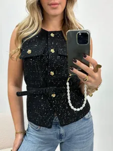 Women's black tweed sleeveless top with gold camellia buttons and matching waist belt.