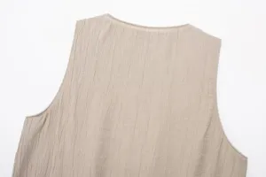 Detail view of the summer textured sleeveless top back design, elegant casual daily wear.