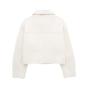 Back view detail of women's off-white cropped textured jacket, stylish casual outerwear.