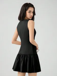 Sleeveless black short dress with ruffled hem, ideal for stylish resort and party wear.