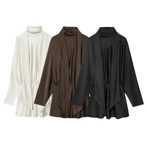 Detailed view of the satin long sleeve draped cowl neck dress in three classic colors.