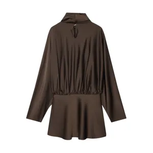 Detail view of the elegant brown satin dress featuring a chic cowl neck and stylish back keyhole.