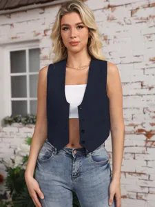 Close-up detail of navy blue crop vest waistcoat paired with white top for summer casual look.