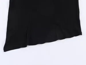 Black asymmetrical sleeveless top hem detail, showing fine stitching and unique cut.