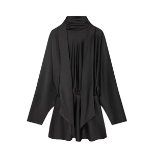 Detailed view of the black satin long-sleeve short dress featuring a chic draped scarf collar.
