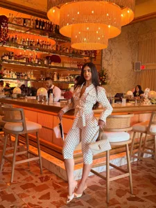 Chic polka dot long sleeve shirt and high waist pants two piece set for women fashion outfit.