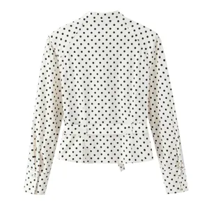 Back view of women long sleeve polka dot shirt, elegant blouse with waist belt detail.