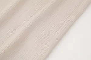 Vista detallada de la textura de tela arrugada de primavera para mujeres, diseño plisado.