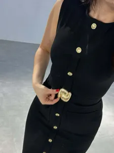 Sleeveless black midi dress with stylish gold buttons and belt for women European style.