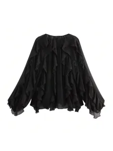 Black long sleeve V-neck blouse featuring chic layered ruffles for a stylish spring look.