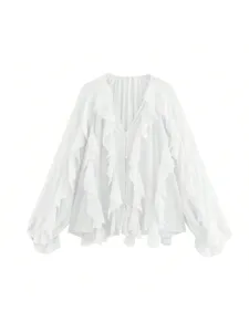 White V-neck chiffon blouse detail showing layered ruffles and delicate buttons.