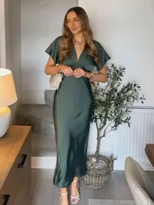 Elegant deep green satin midi dress featuring a V-neck and short sleeves for chic summer style.