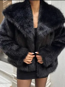 Close-up detail of the black artificial fur lapel coat, showcasing soft texture and cozy fit.