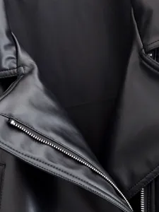 Black PU leather jacket detail, classic lapel with silver zipper, stylish autumn outerwear.