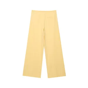 Pantaloni lunghi larghi casual da donna tinta unita vista posteriore dettaglio primavera.