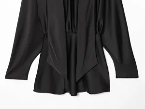 Sleek black satin long sleeve top featuring an elegant scarf collar and draped details.