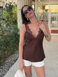 Elegant brown silk-satin camisole featuring delicate lace V-neck trim for a chic stylish look.