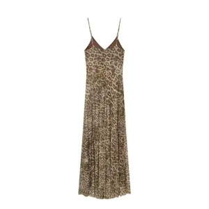 Close up view showing the stylish leopard print pattern and strap detail of the long dress.