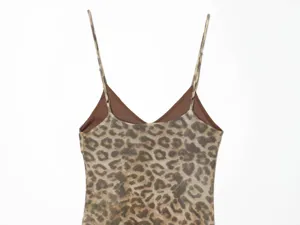 Close-up detail of the chic leopard print V-neck camisole dress, elegant strap design.