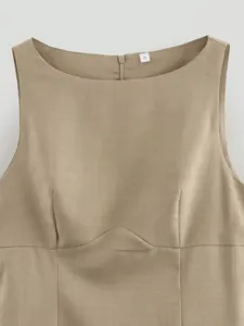 Khaki sleeveless dress detail showing scoop neckline, bust darts, and structured underbust seam.