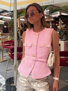 Pink tweed vest for women, sleeveless button-down crop top with belt and gold buttons.