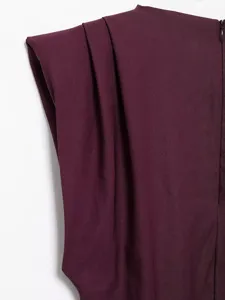 Burgundy pleated shoulder pad top detail view showing exquisite asymmetric fabric texture.