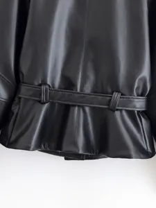 Black faux leather short trench coat with stylish waist belt detail and pleated hem.