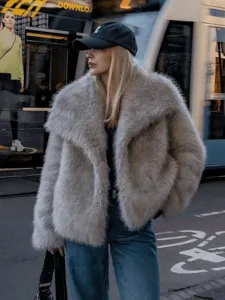 Detailed view of the stylish women's faux fur lapel jacket in a trendy street style look.