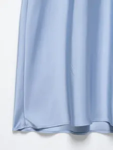 Light blue satin dress detail view, smooth shiny fabric texture for casual chic style